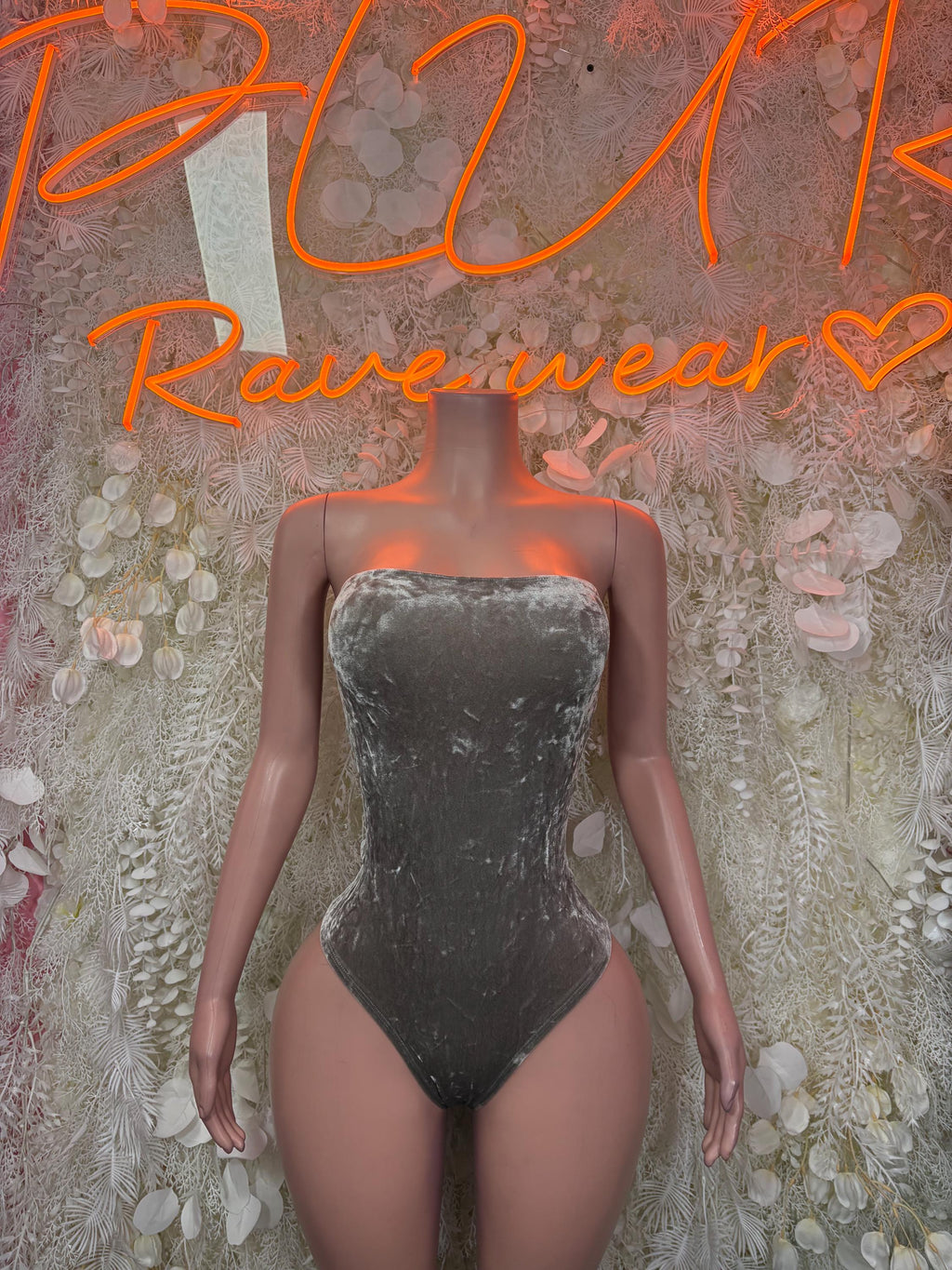 Gray velvet strapless bodysuit with sweetheart neckline, fitted leg cut