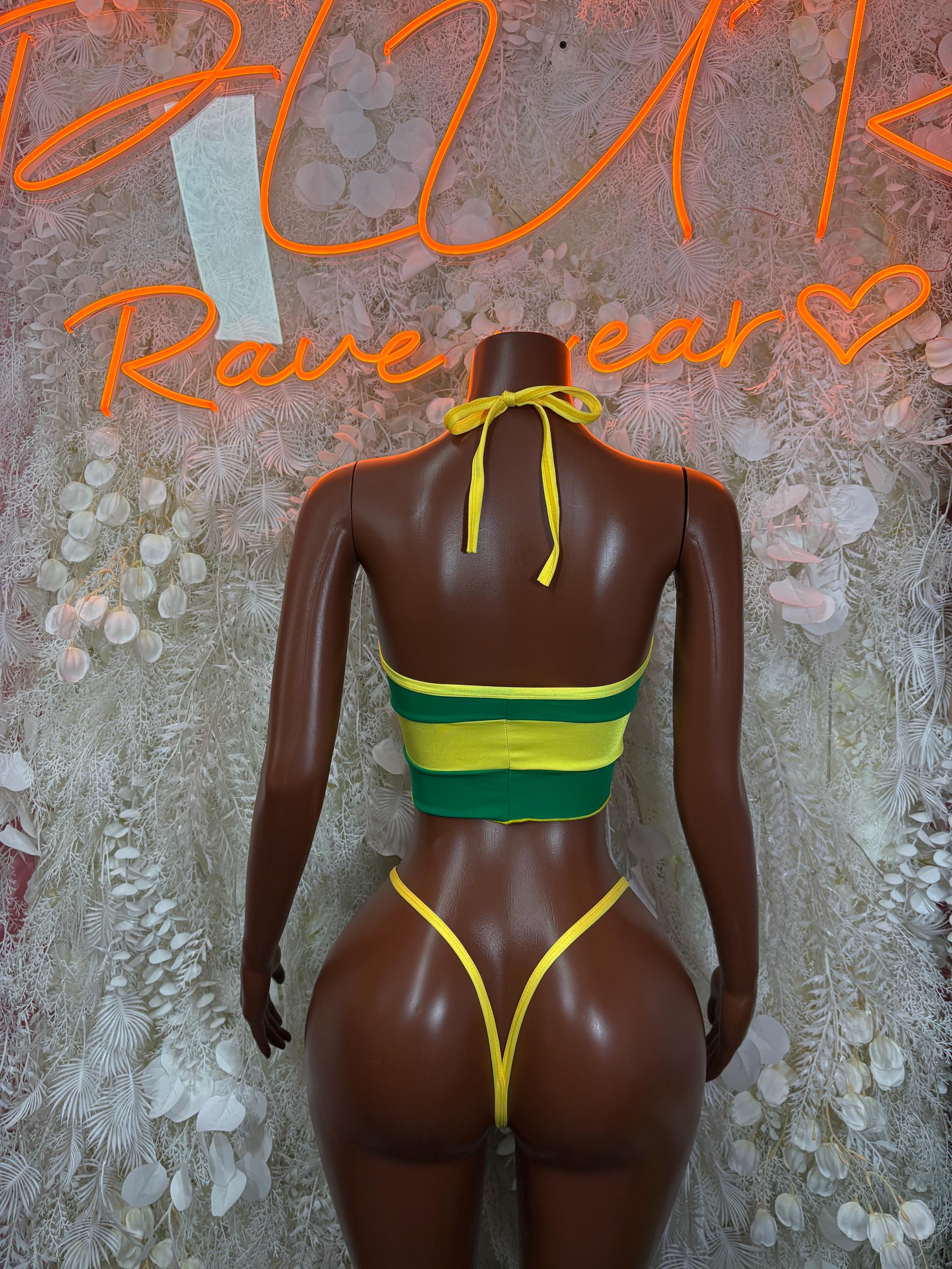 Back view of green and yellow two-piece bodysuit with tied neck and thong bottoms