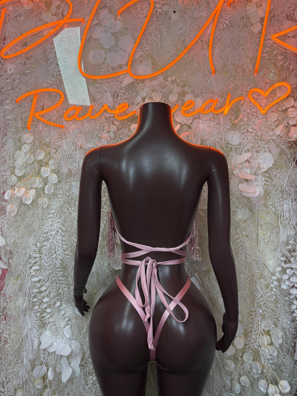 Pink fringe bandeau two-piece set with crisscross back straps and mesh thong