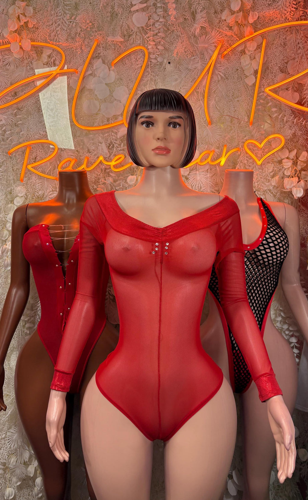 Red mesh long-sleeve bodysuit with small chest cutout and buttoned front