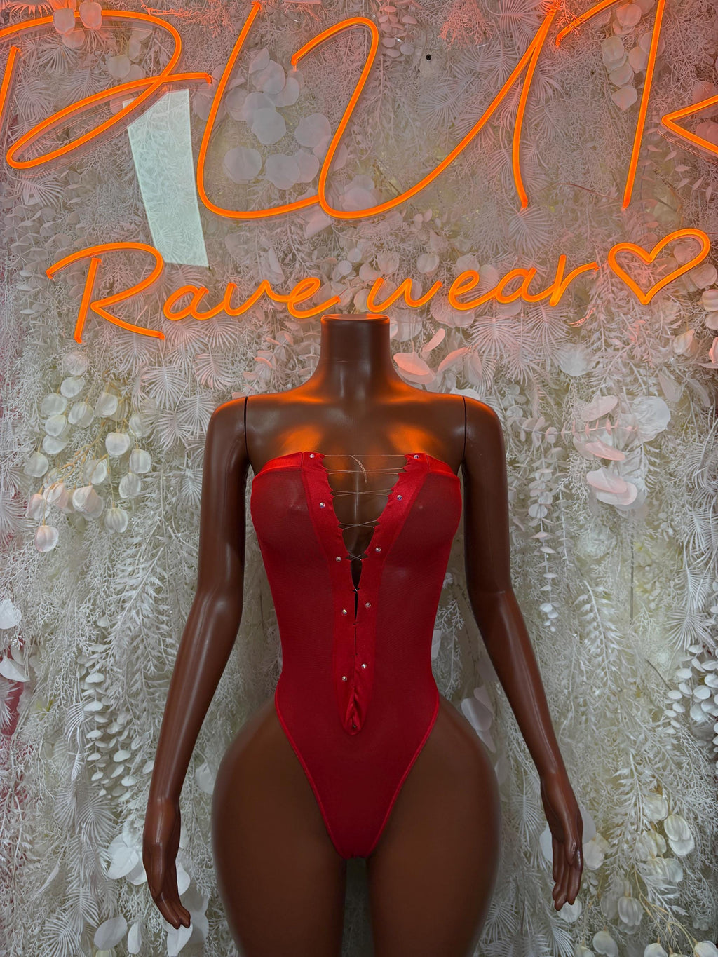 Red long-sleeve bodysuit with V-neck and high-cut front