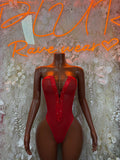 Red long-sleeve bodysuit with V-neck and high-cut front