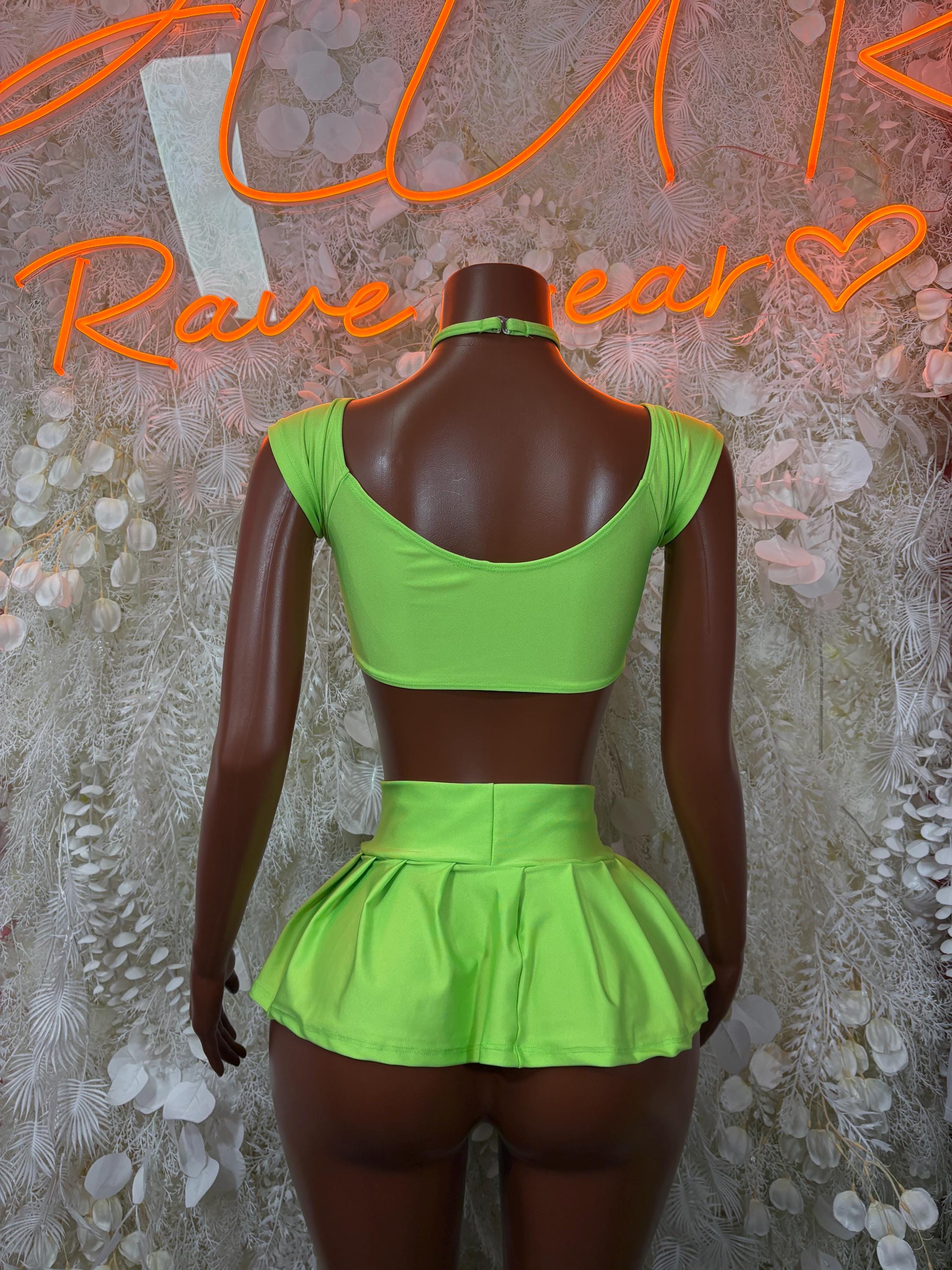 Neon green halter-back crop top and pleated mini skirt set with keyhole back