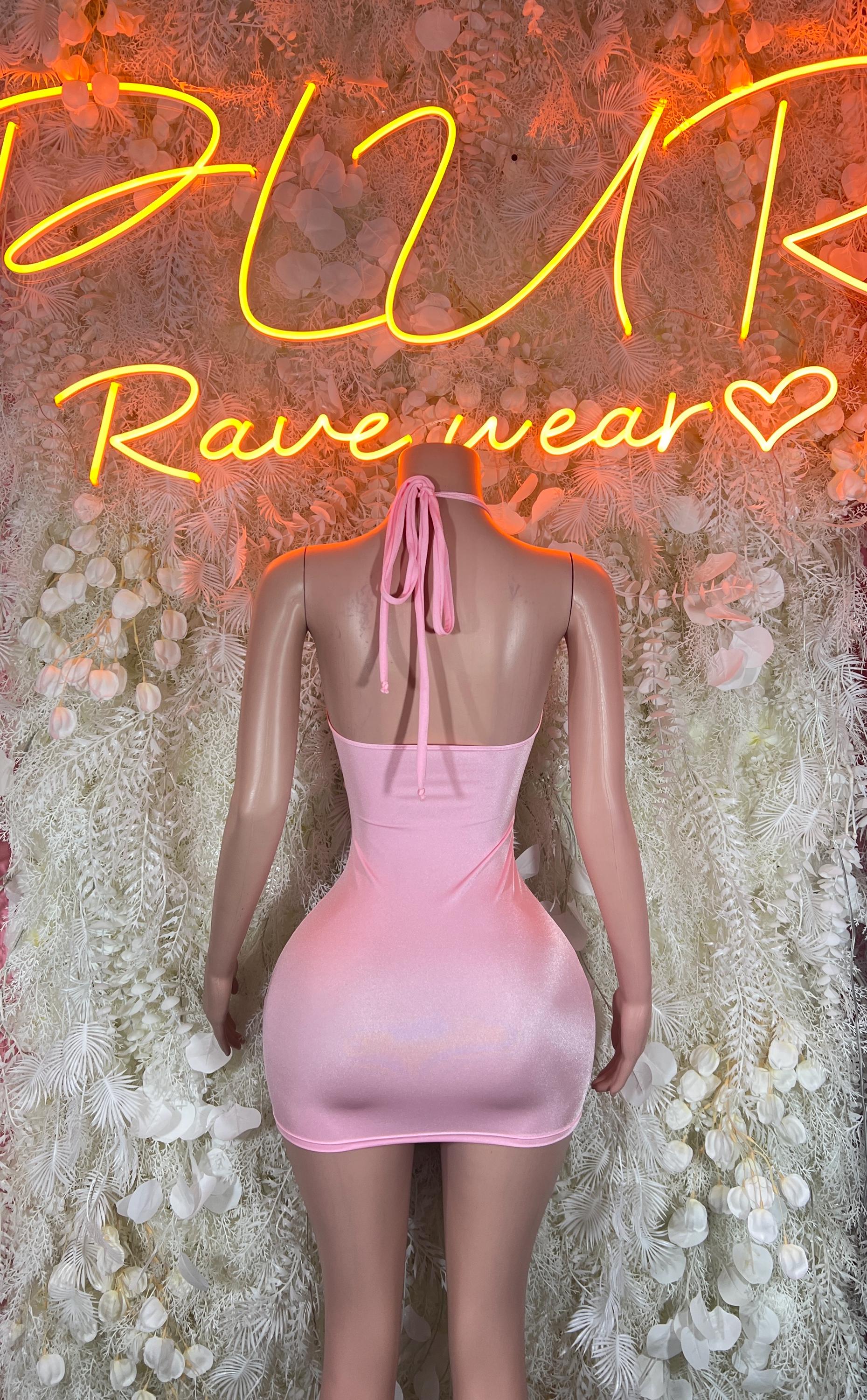 Pink mini backless dress with halter straps and gathered tie at center back