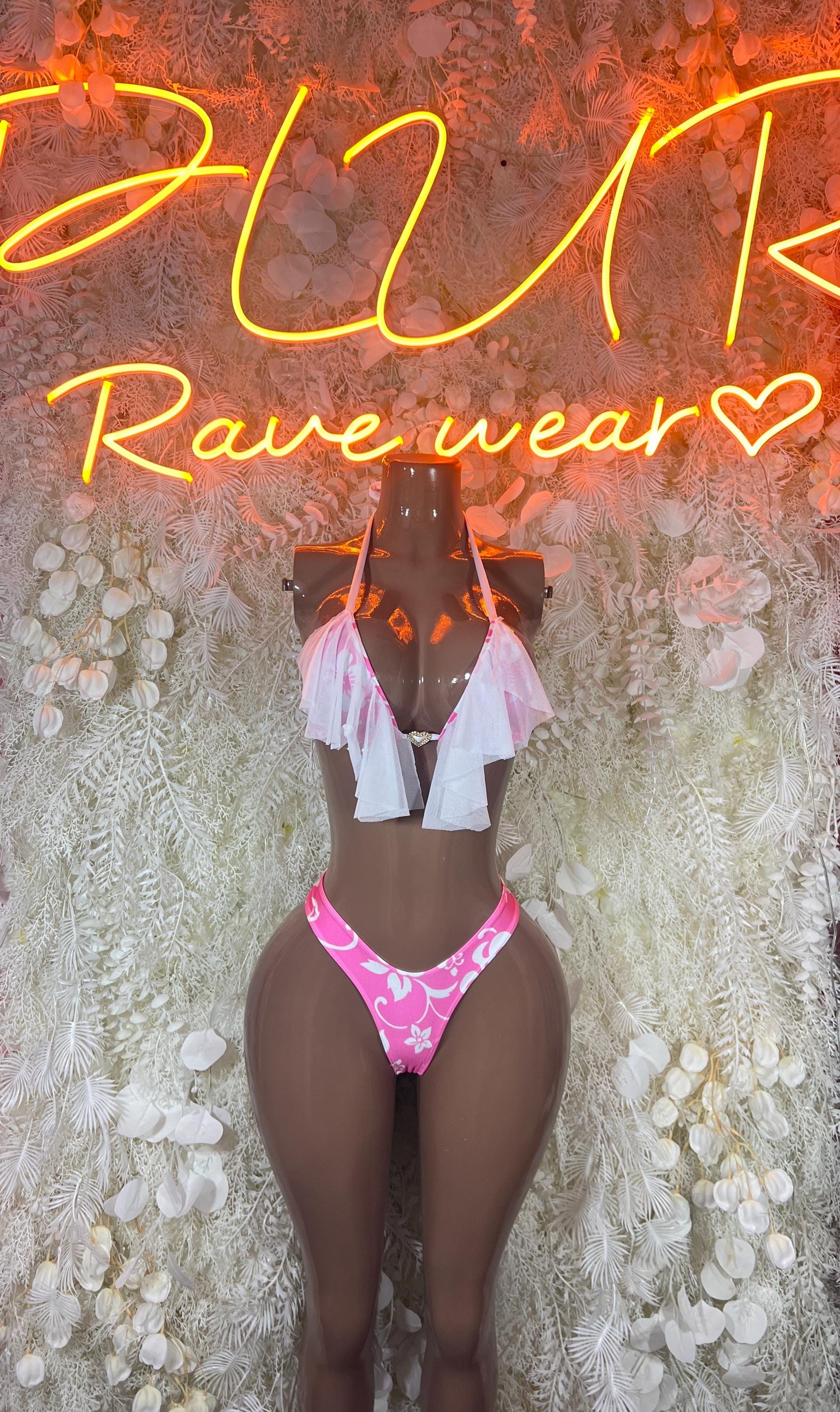 Pink ruffle skirt set with heart-print thong bottoms and white side ties