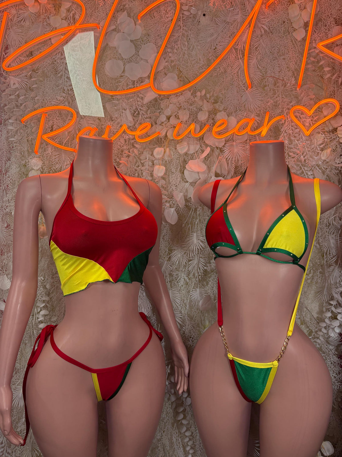 Bolivian flag bikini set on two models, red-and-yellow tops with green-and-red side ties