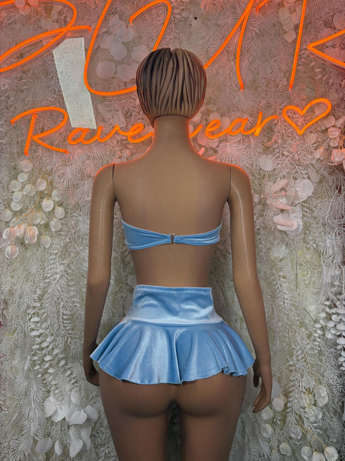 Light blue back view of two-piece skirt set with lace-up top and ruffled mini skirt