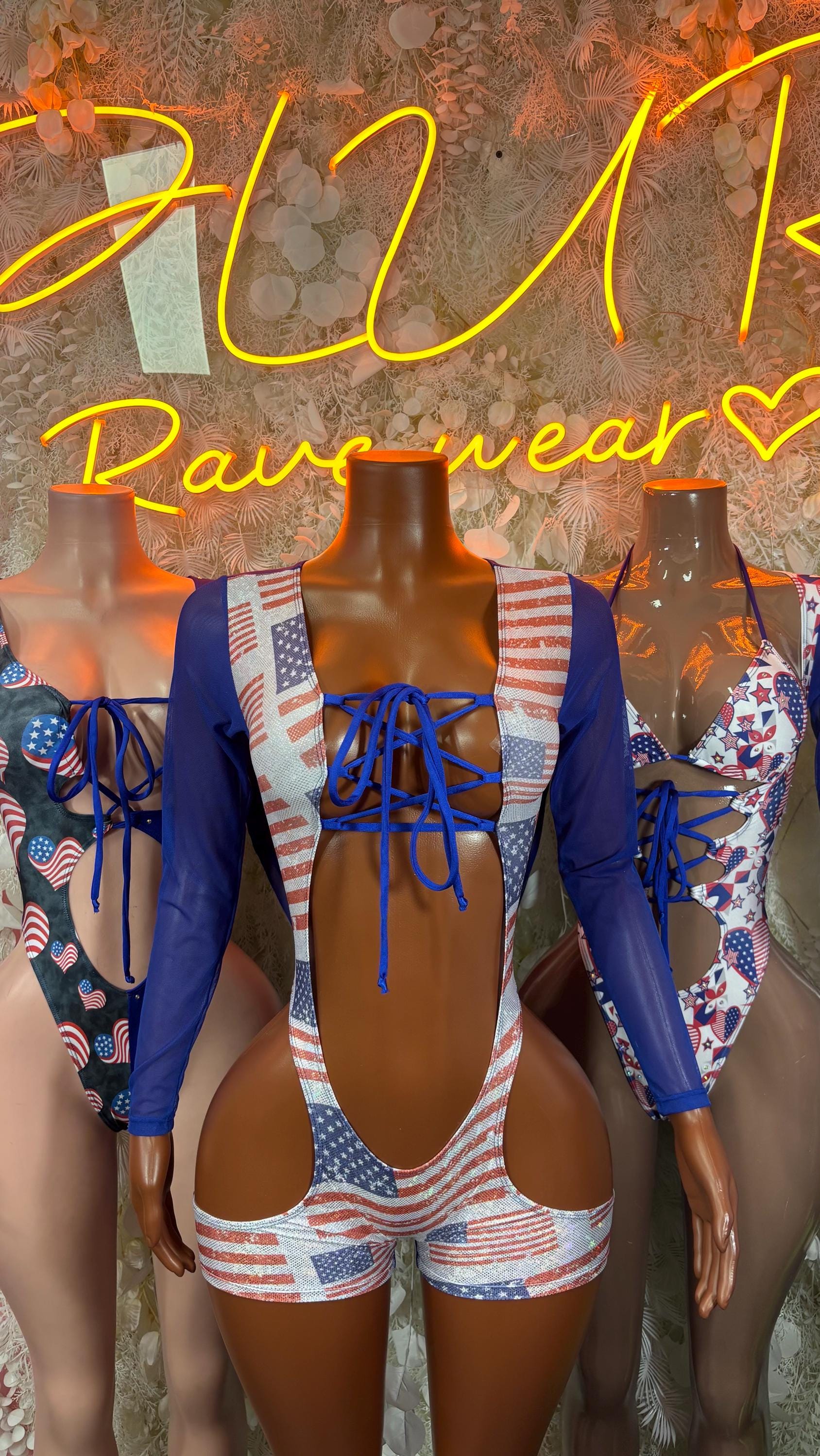 Patriotic bartender-style costume bodysuit with striped panels, lace-up front and stars