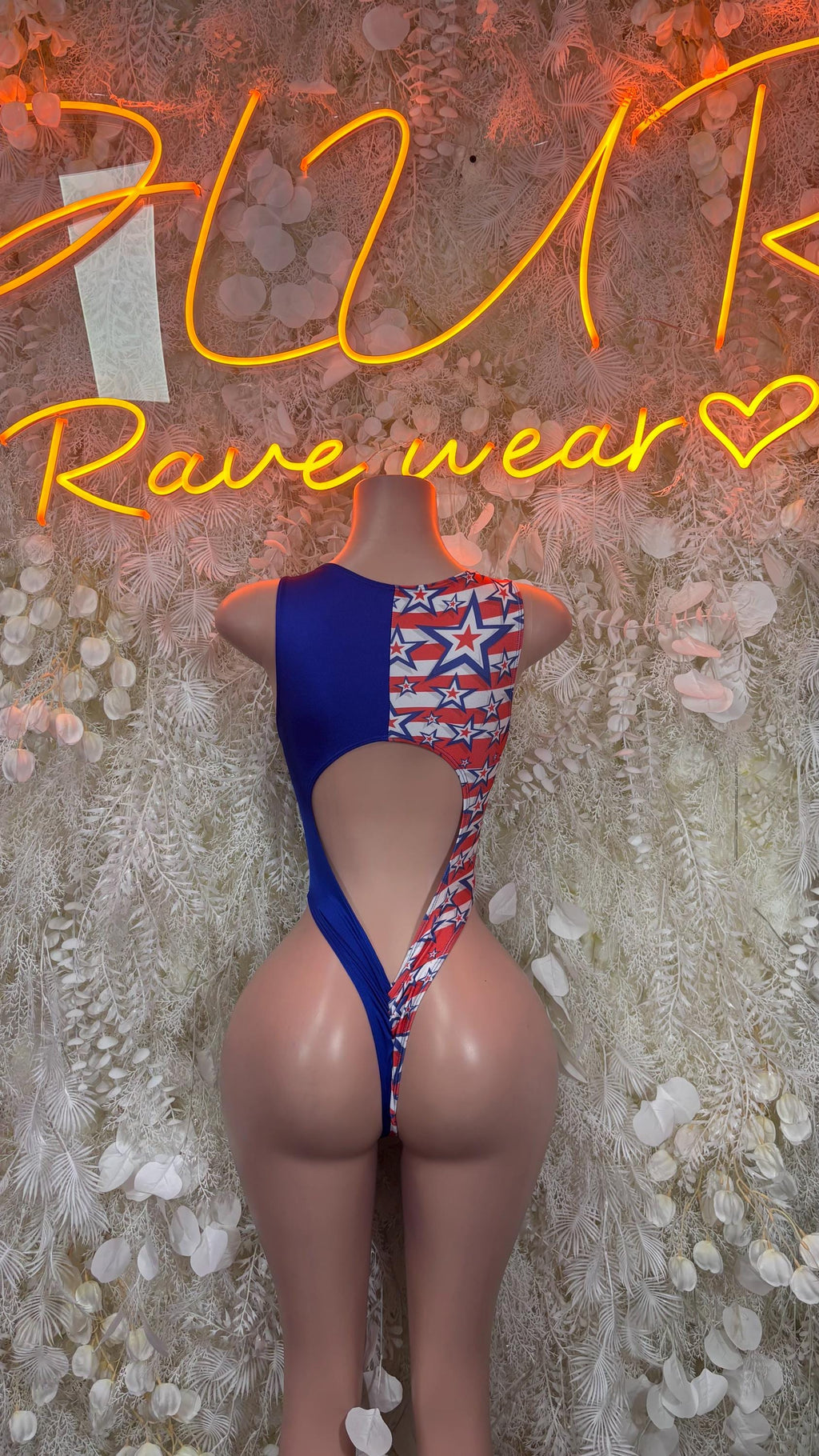 Blue patriotic halter bodysuit with stars-and-stripes back panel and lace-up strap ties