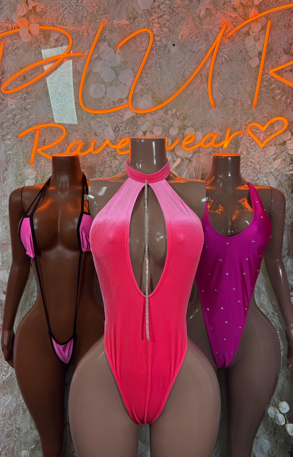 Pink rhinestone halter bodysuit with high neck and keyhole cutout