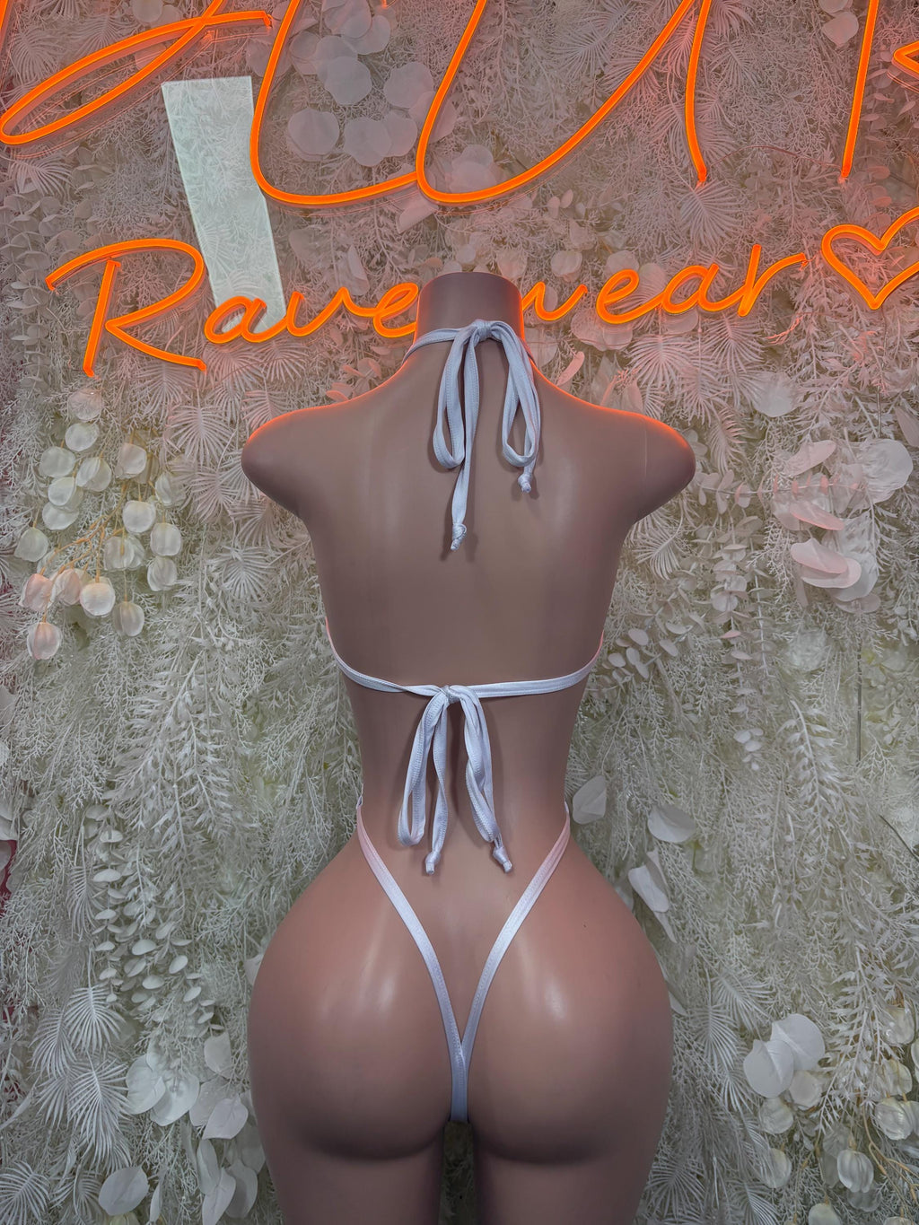 Silver cheetah-print hologram bodysuit with lace-back tie and high-leg cut