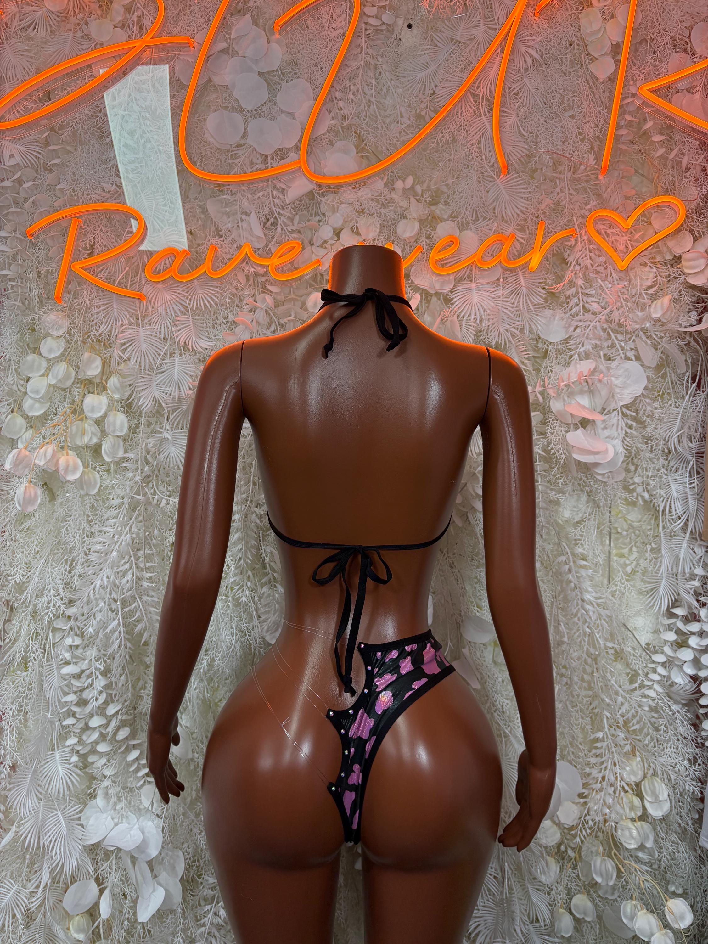 Pink and black cow-print strappy bikini set, back view with center bow