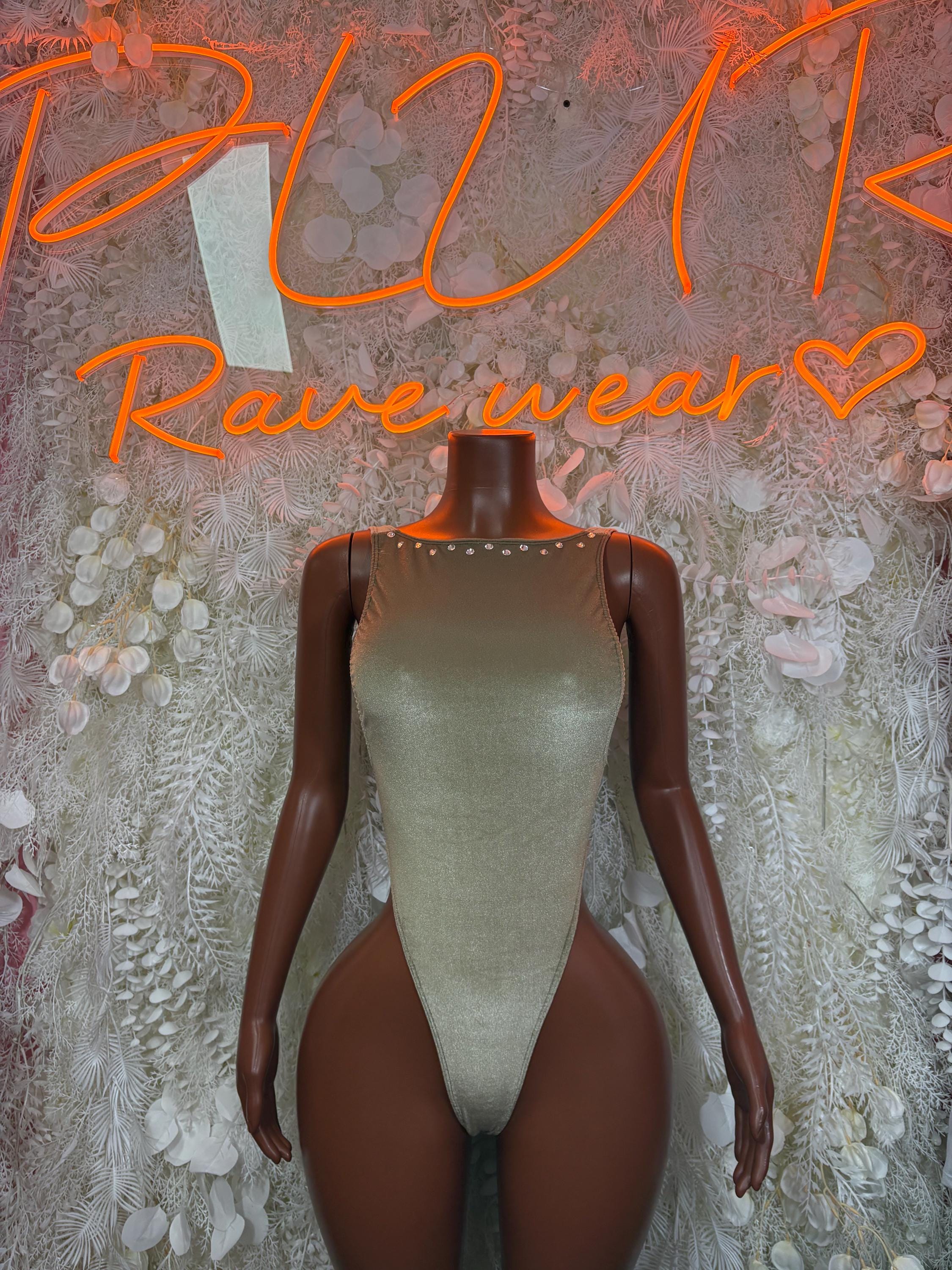 Tan velvet bodysuit with long sleeves and deep front V neckline