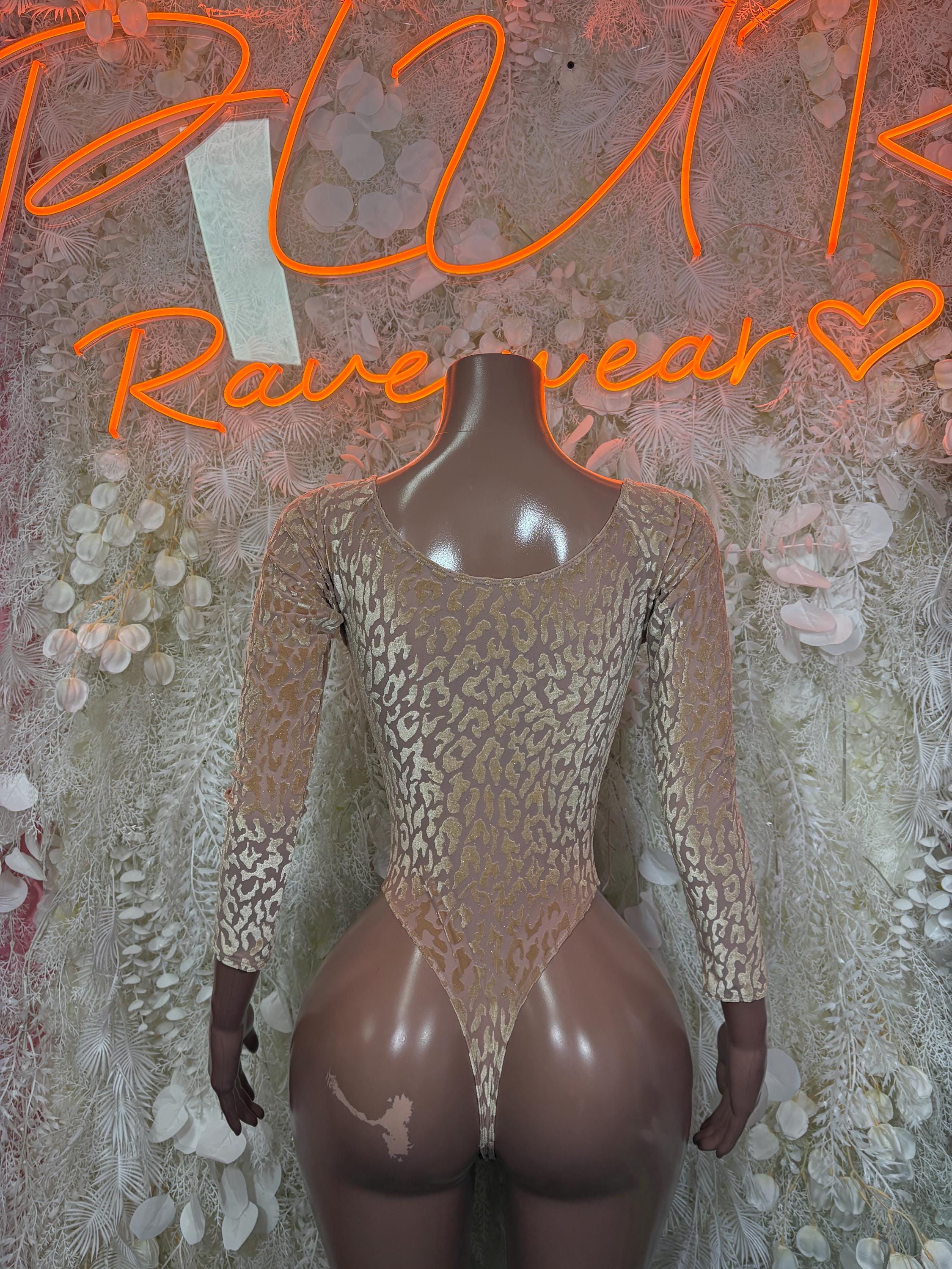 Tan long-sleeve snakeprint bodysuit with scoop neck and sheer back cutouts