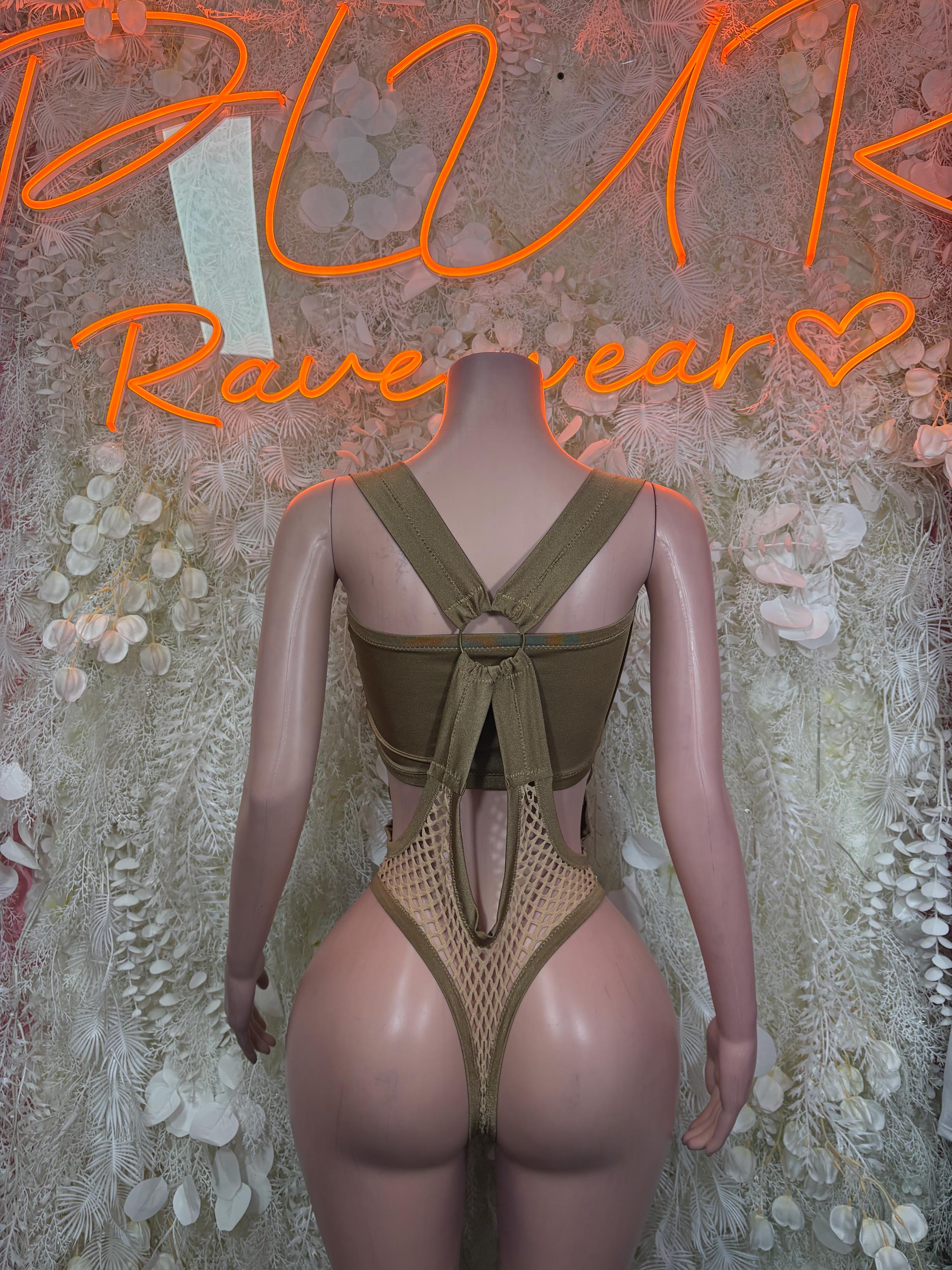 Tan fishnet bodysuit with cross straps, deep V neckline, and cheeky coverage
