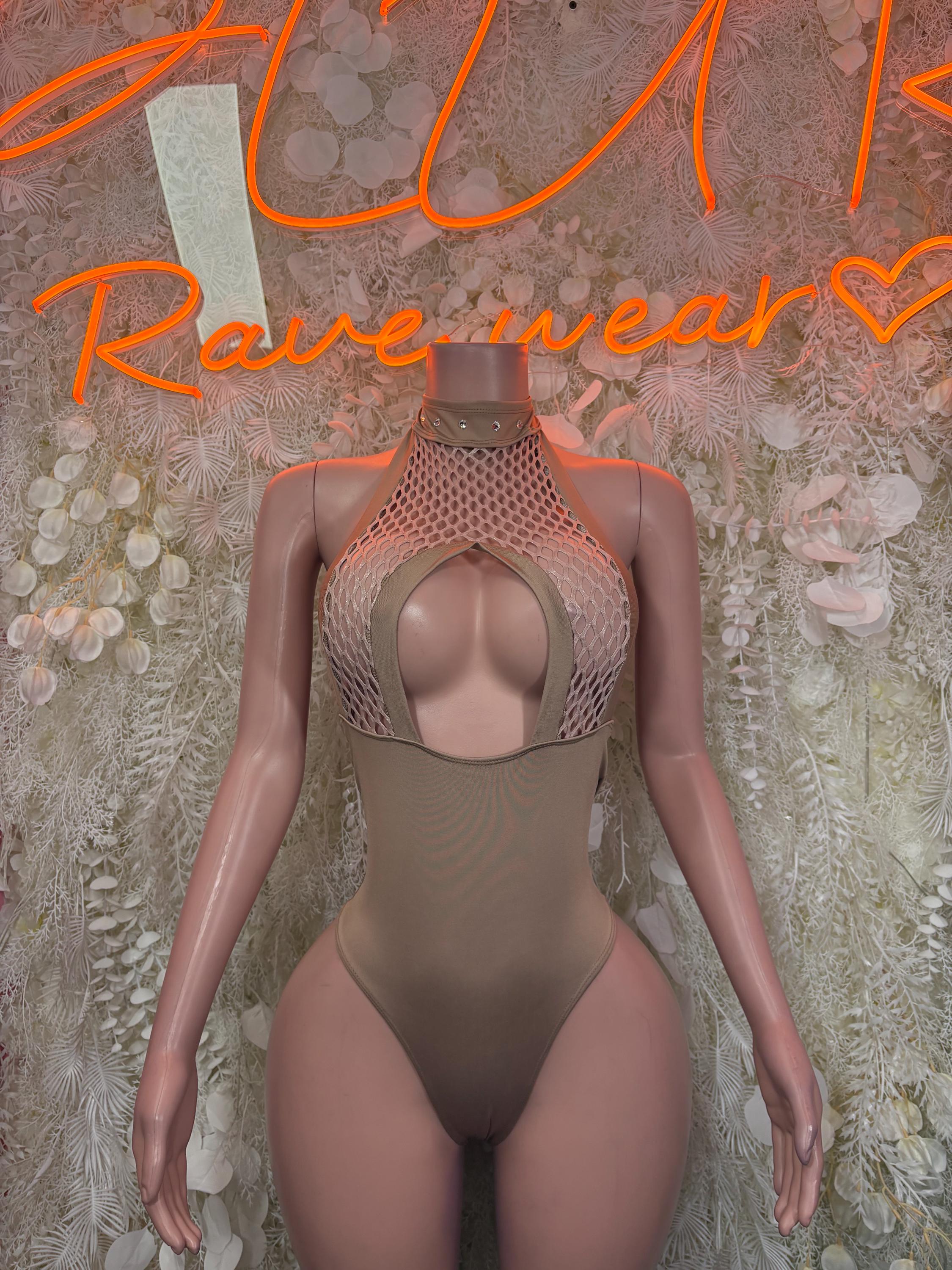 Tan one-piece bodysuit with lace-like mesh halter and open center chest cutout