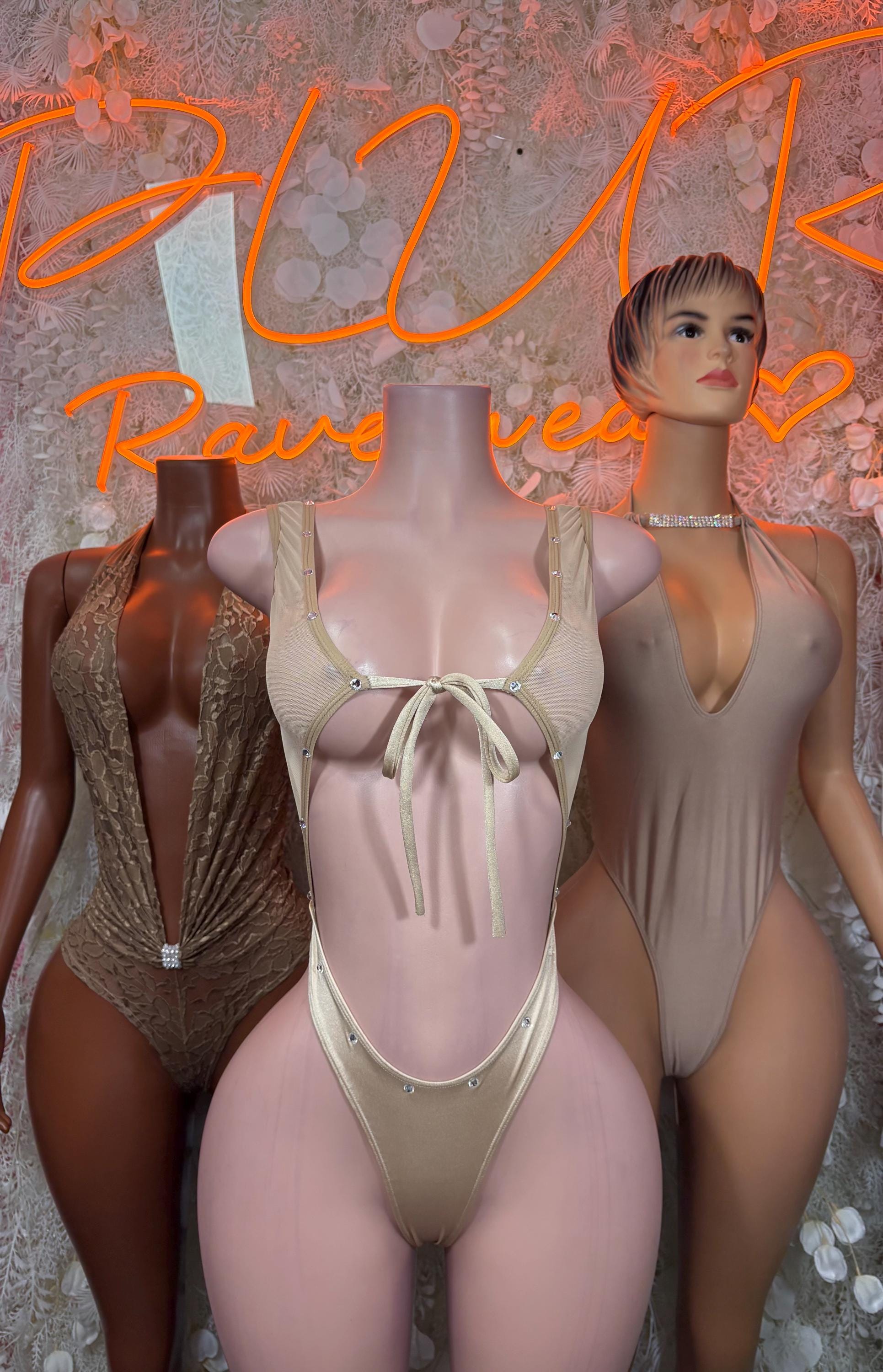 Nude halter bodysuit with back straps and front tie, worn front view