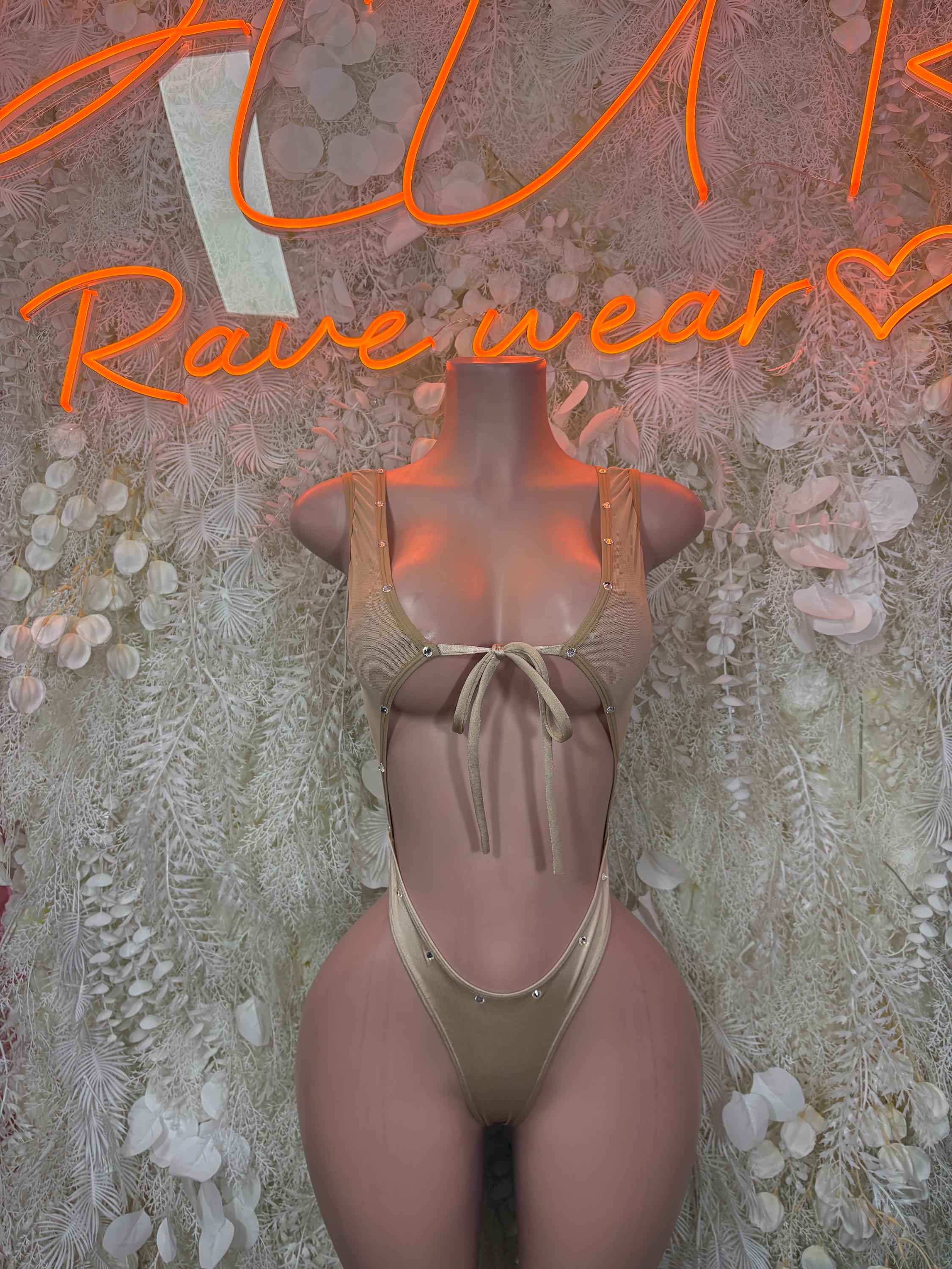 Nude halter one-piece bodysuit with tied front and cheeky coverage