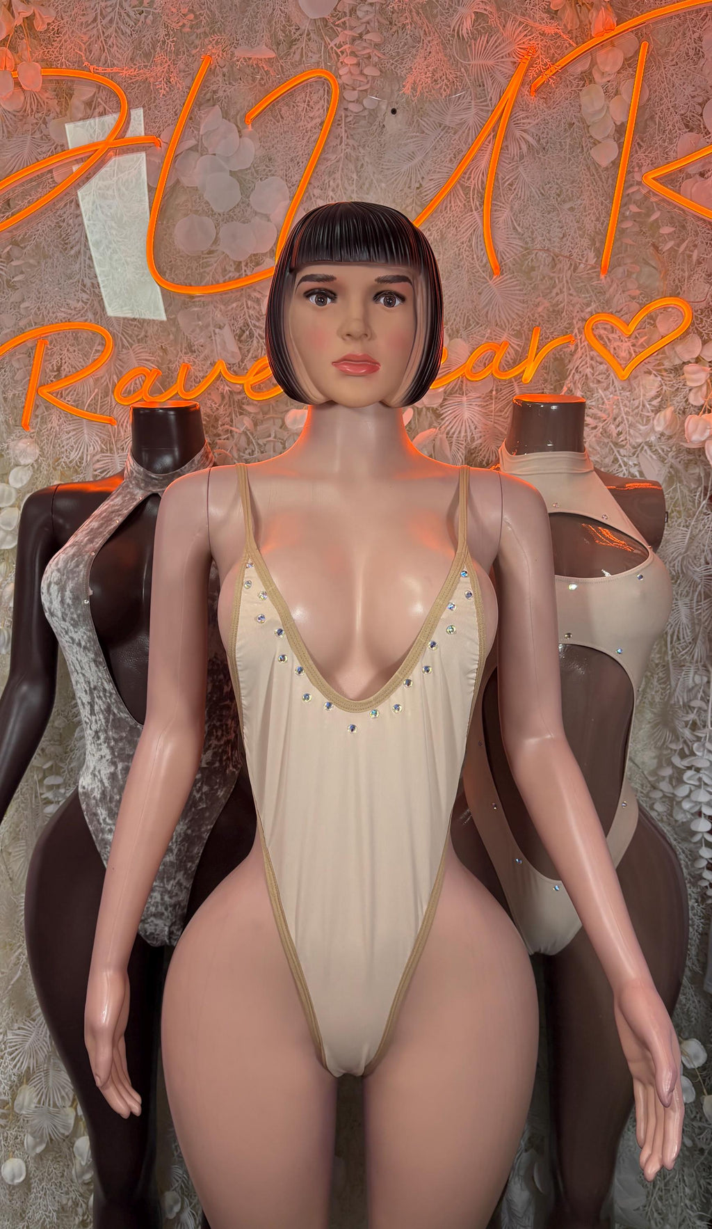 Nude velvet one-piece bodysuit with deep V neckline