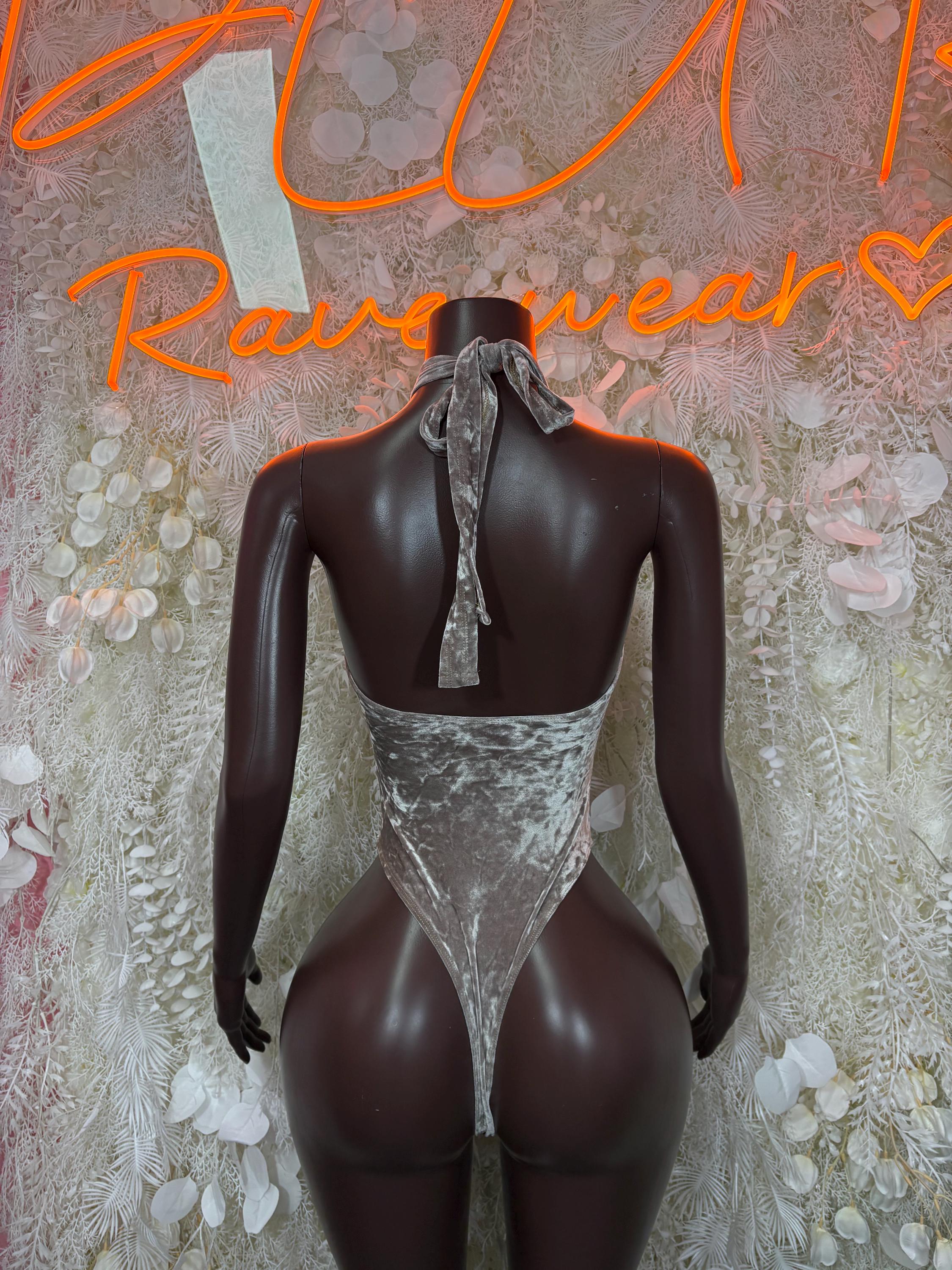 Silver velvet bodysuit with open back and neck tie detail