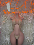 One-piece lingerie bodysuit, pale gold, deep V neckline and thong back