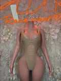 Gold rave bodysuit one-piece with scoop neckline and vertical slit front detail