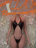 Black hologram cheetah dancewear set with bra, thong, and tie straps