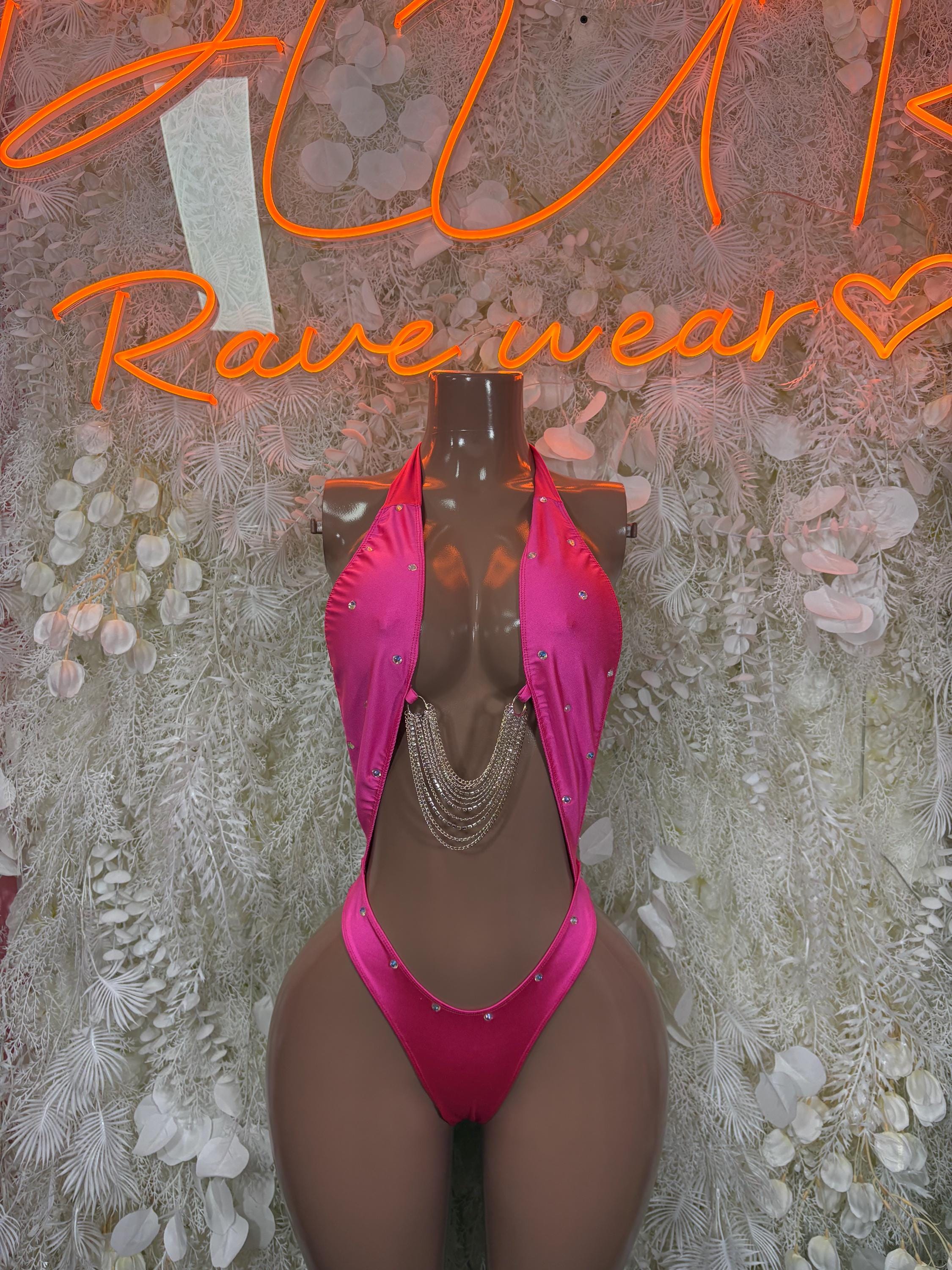 Pink rhinestone halter bodysuit with chain fringe and thong-style bottom