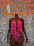 Pink fringe bodysuit with V-neckline and dangling front tassels