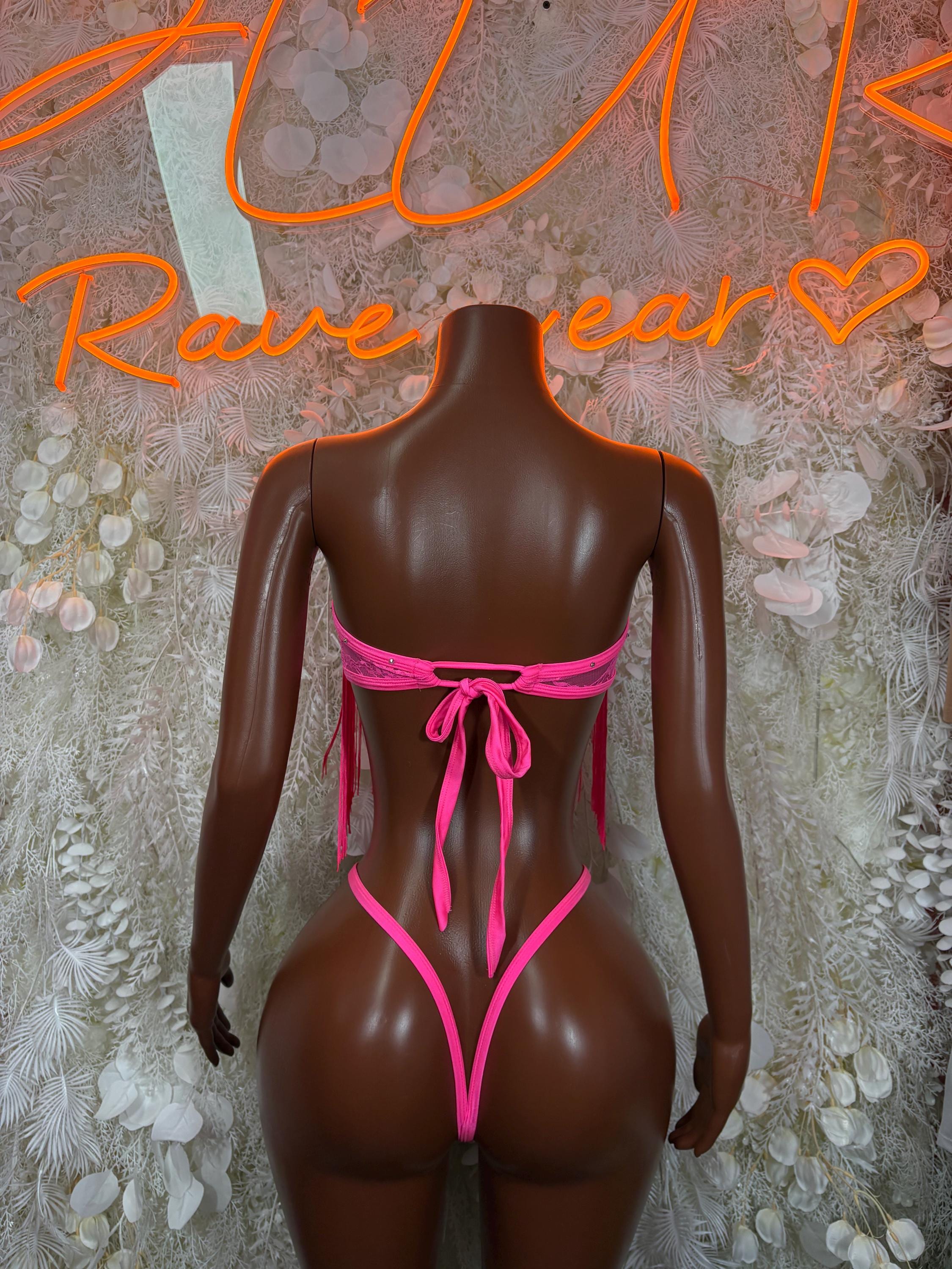 Pink backless bodysuit with tie-back ribbon and open V-cut waist