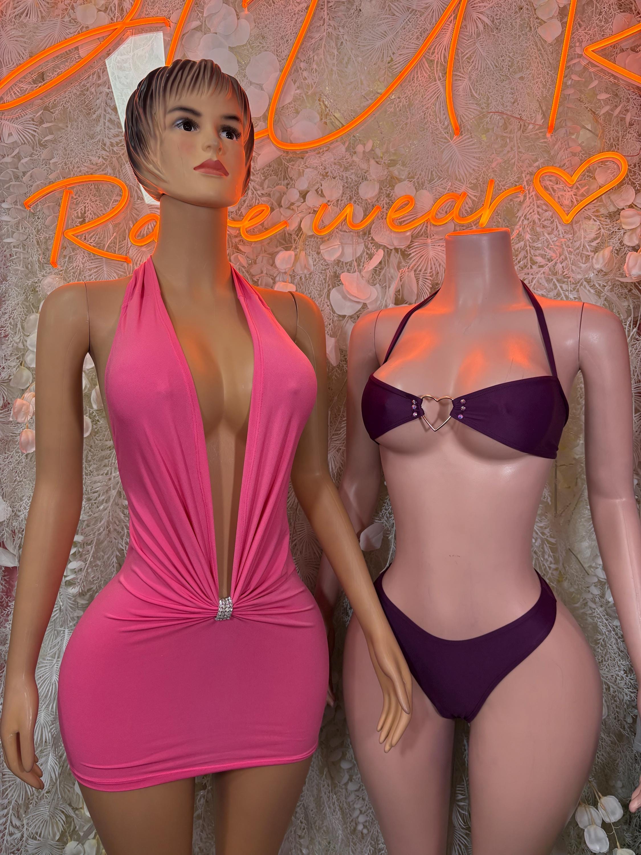 Purple two-piece bikini set with triangle bra top and lace-up string bottoms