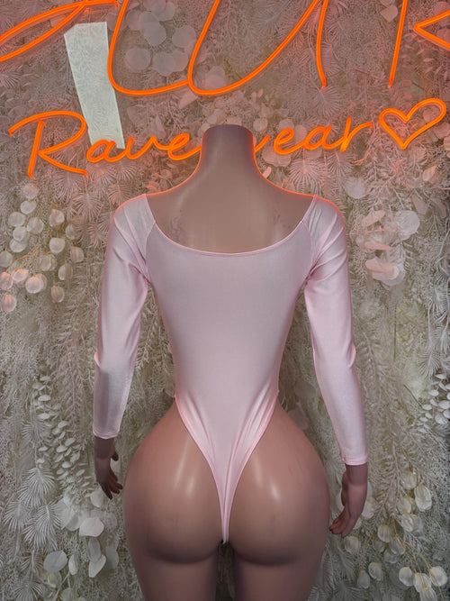 Pink long-sleeve bodysuit with scoop neckline and fitted one-piece shape