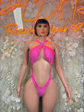 Pink glitter halter bodysuit with crisscross straps and thong back detail