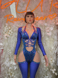 Blue metallic bodysuit with V-neck, long sleeves, crisscross lace-up and cutout front