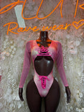 Pink metallic long-sleeve bodysuit with lace-up corset front and thong-cut bottom