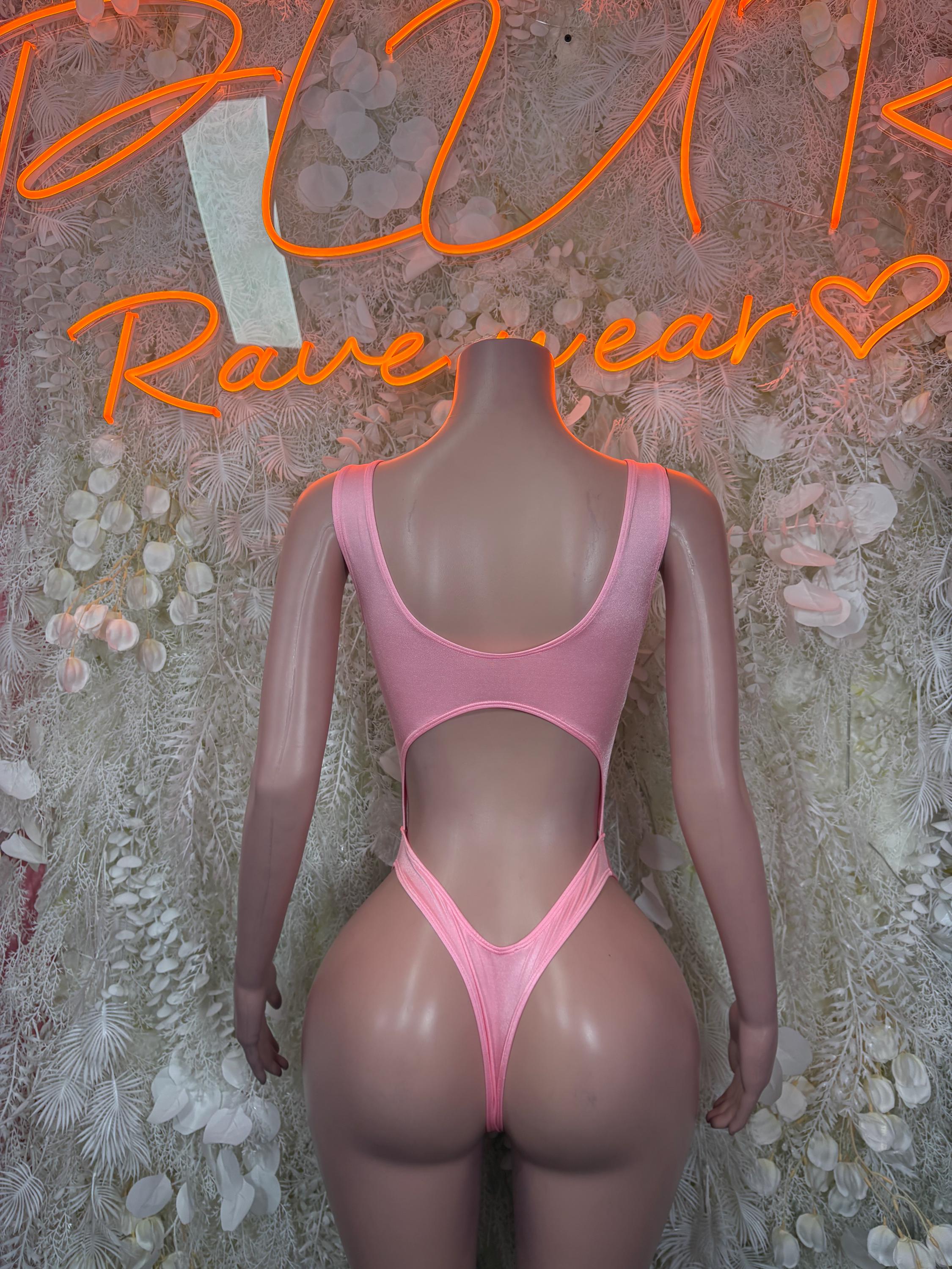 Pink sleeveless bodysuit with plunging front cutout and high-leg thong bottom