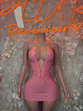 Red-and-white checkered mini dress with deep V neckline, sleeveless