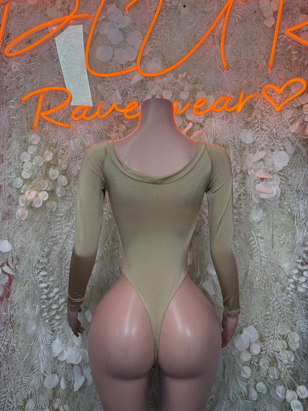 Olive-green long-sleeve bodysuit with scoop neckline and high-cut one-piece fit