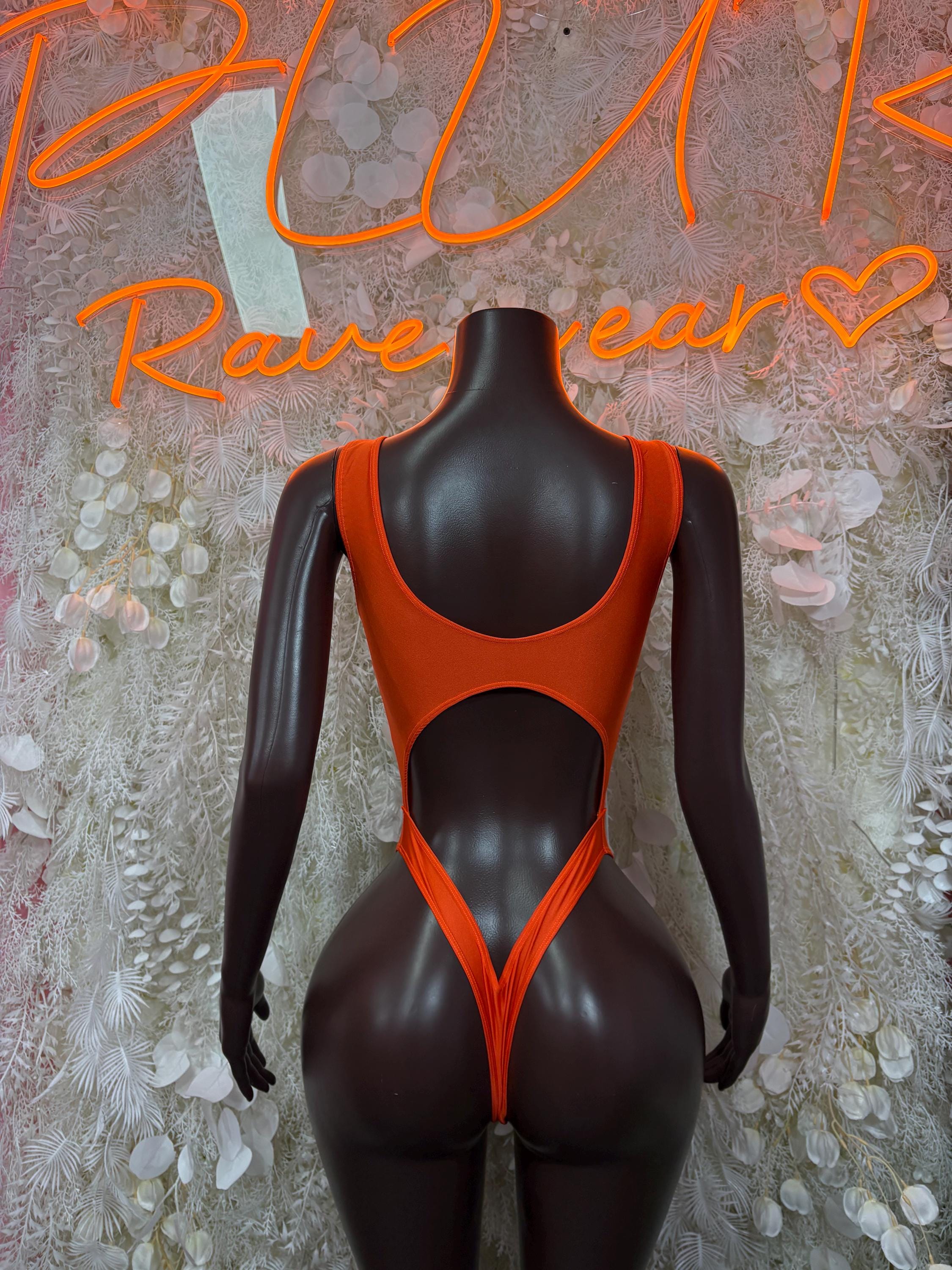 Neon orange one-piece bodysuit with wide back straps and V-shaped cutout