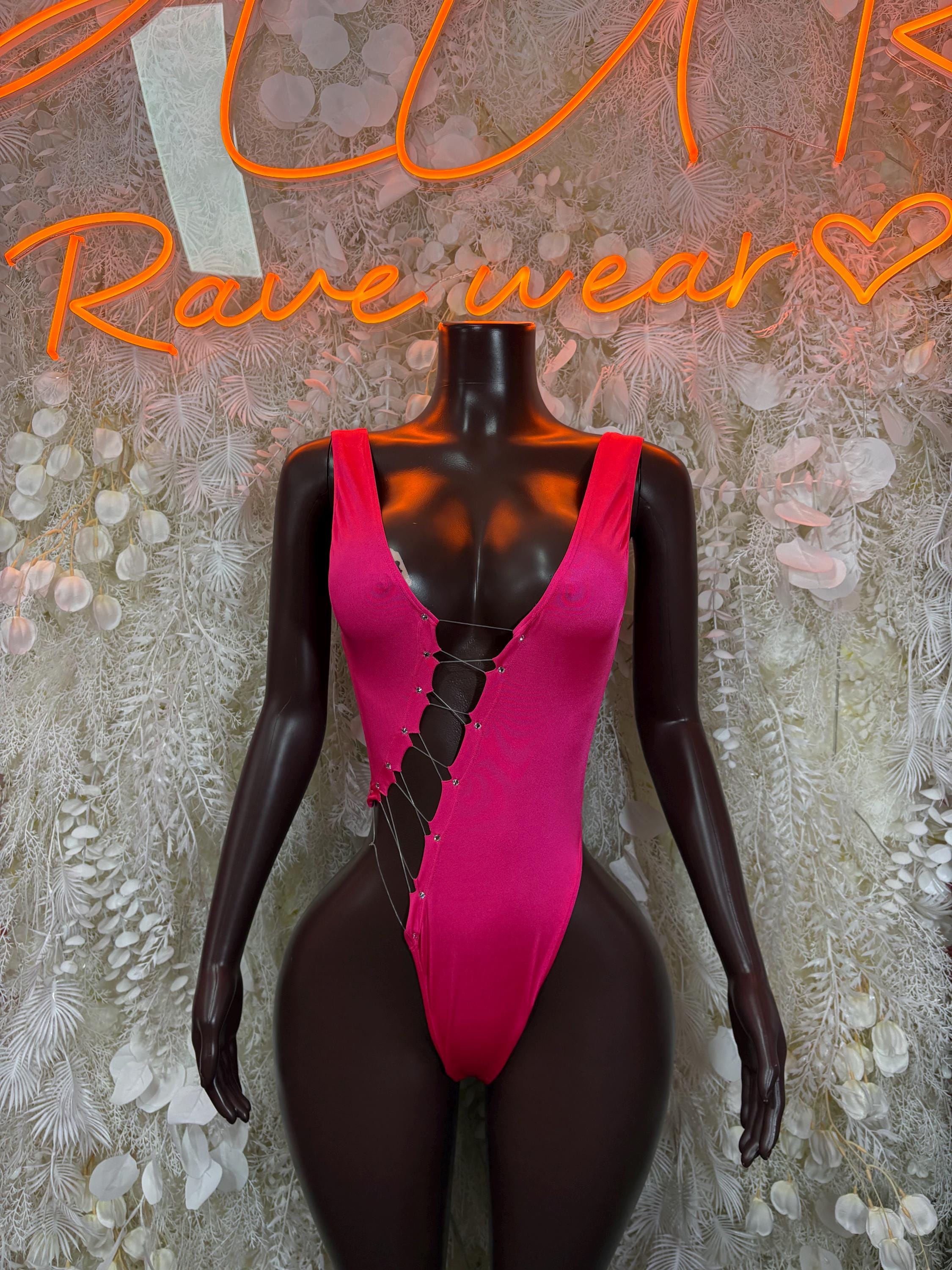 Pink one-piece bodysuit with sweetheart neckline and crisscross front lacing