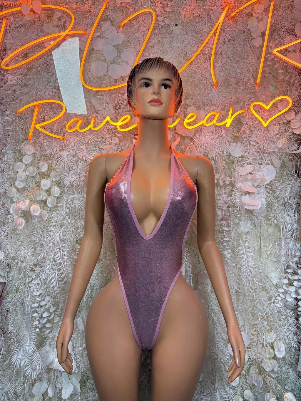 Pink metallic one-piece bodysuit with deep V neckline and halter straps