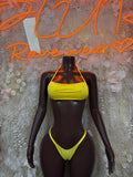 Yellow bikini with triangle top and thong-style bottom, thin neon straps