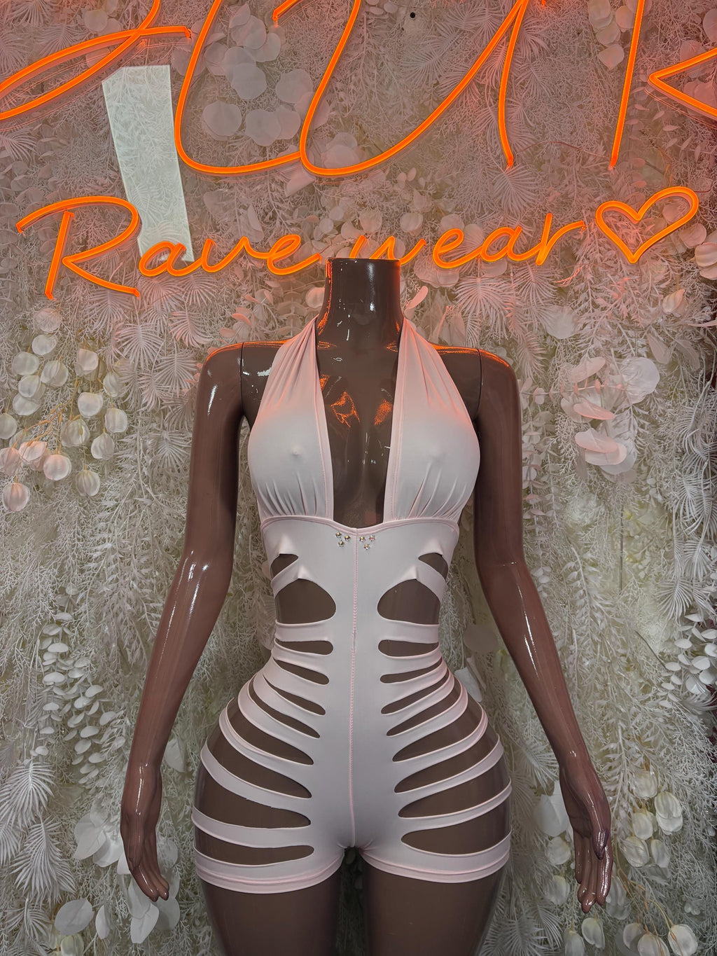 Pink halter cutoff bodysuit with white cutout rib design