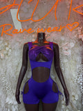 Purple one-piece dance bodysuit with twisted front and keyhole cutouts