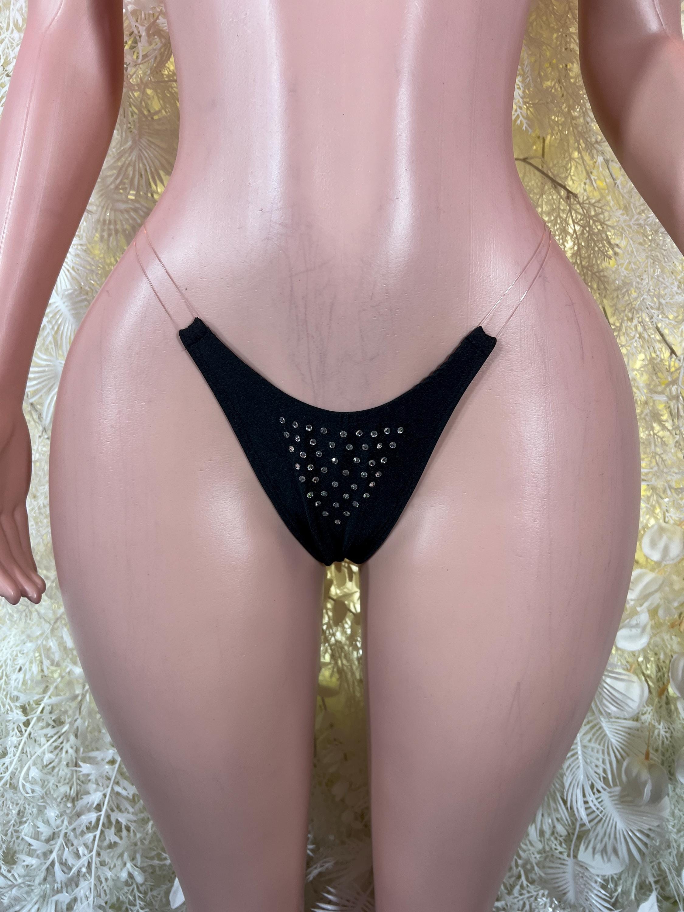 Black g-string underwear with rhinestone-trim triangle at back