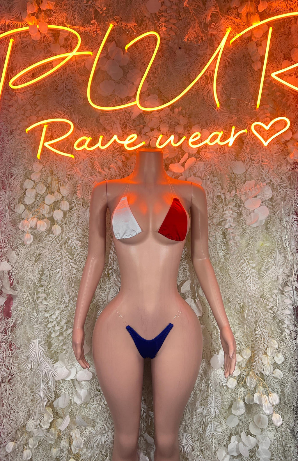 Two-piece bikini with red and white triangle cups and blue bikini bottom