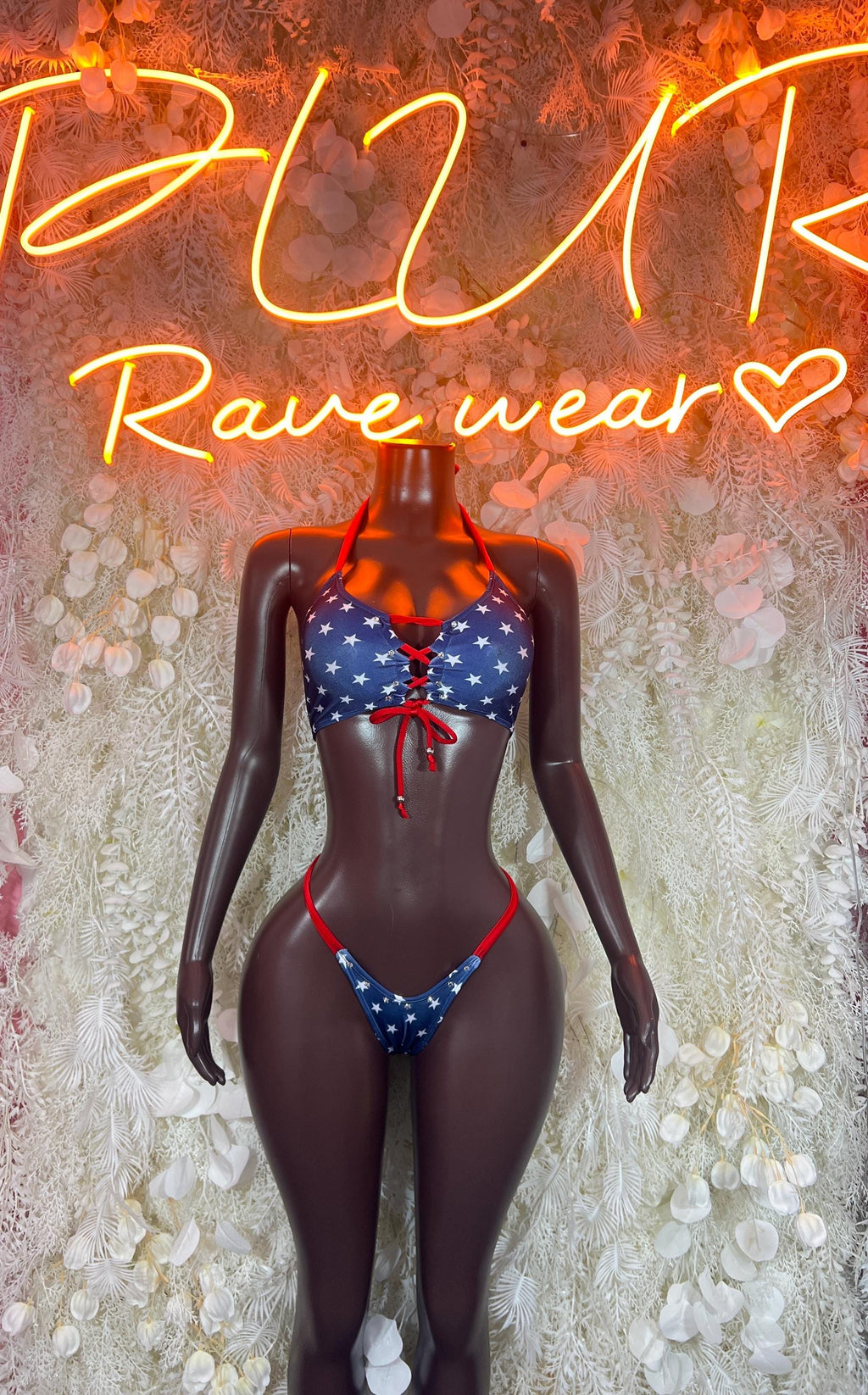 Two-piece patriotic bikini set, blue star print with red bow-tie straps and bottoms