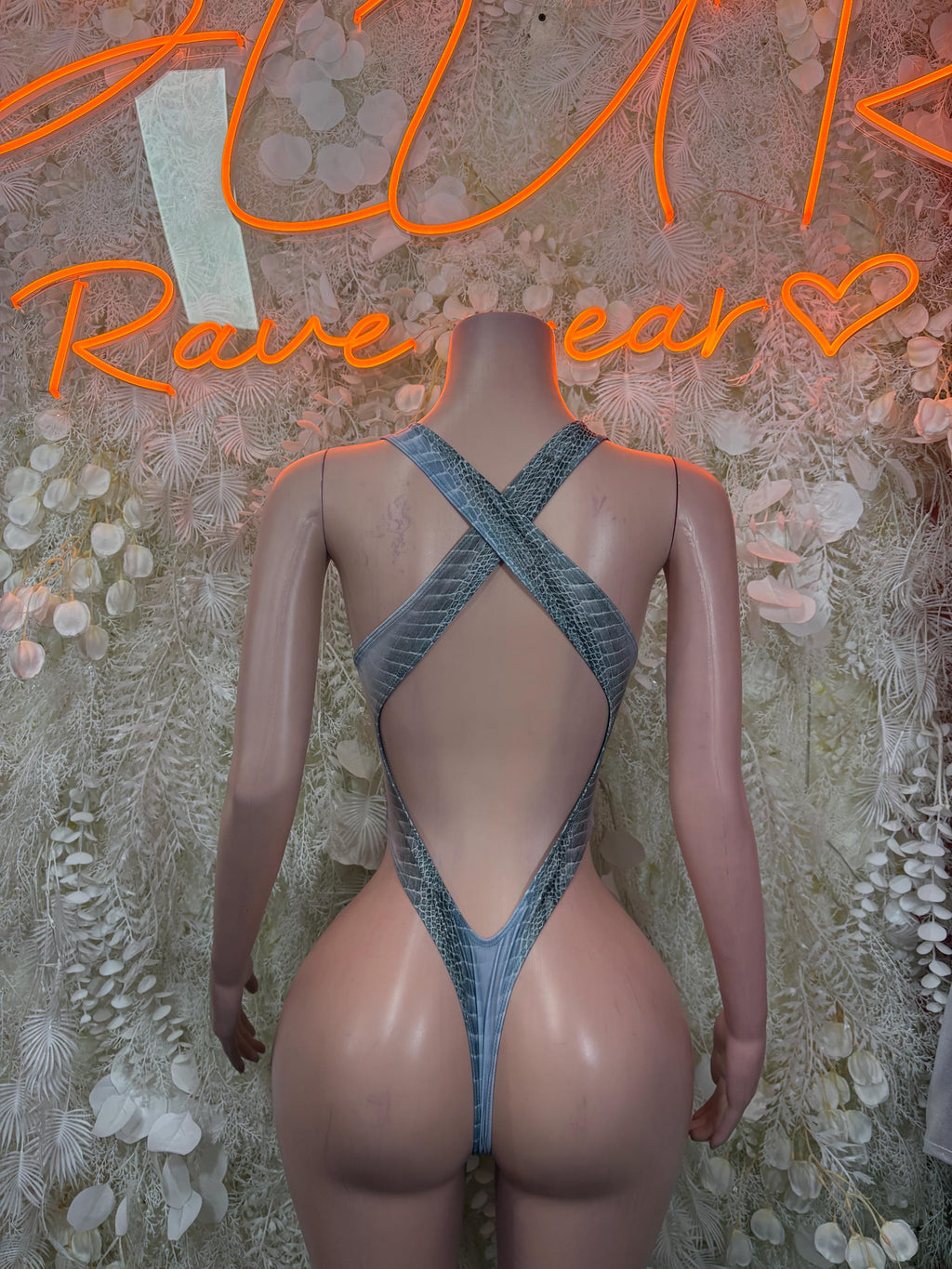Snake print one-piece dancewear with crisscross back straps and cheeky cut, teal blue
