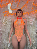 Orange one-piece bodysuit with halter neckline and cutout chest detail