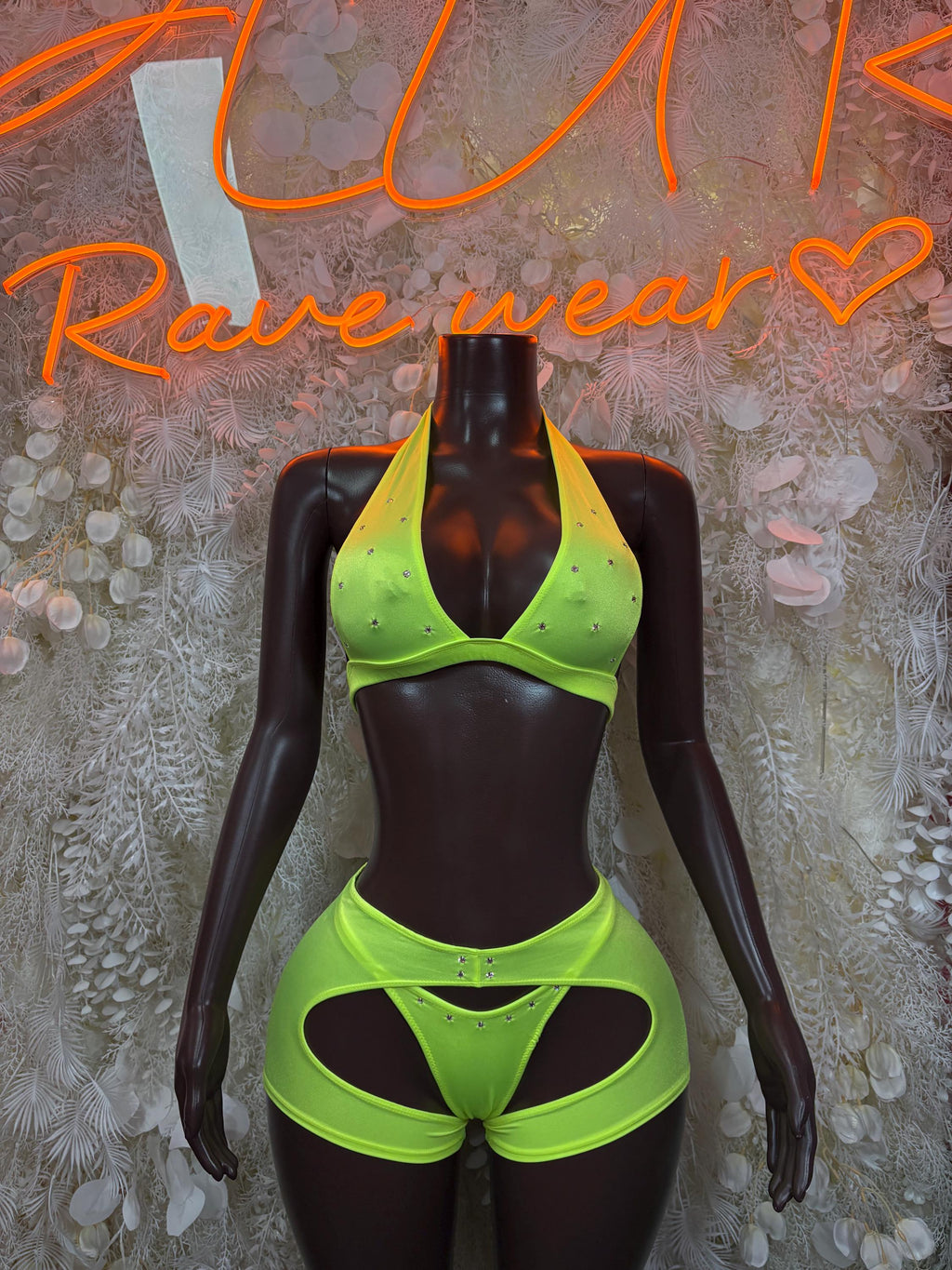 Neon green ravewear set: neon bralette and high-cut bottoms